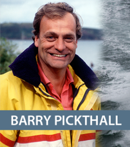 Profile photo of Barry Pickthall, smiling and wearing a yellow wet weather jacket.